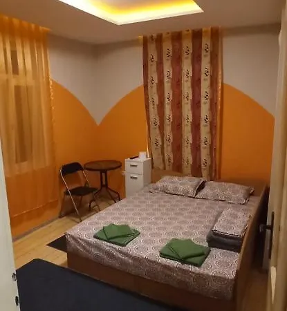 къща